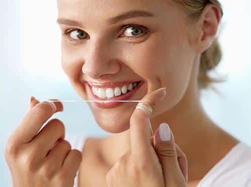 When should I floss during the day